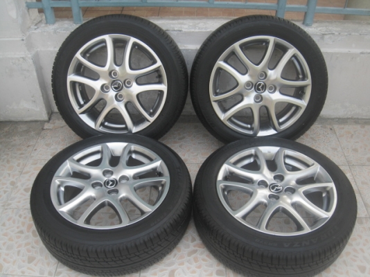 ขายล้อแม็ก mazda2 16"x6.5" et50 4 รู 100 สีไฮเปอร์แบล็ค ยาง bridgestone turanza er370 185/55r16 ยางผลิตสัปดาห์ที่ 6 ปี 13 vios, yaris, fiesta , swift ใส่ได้ครับ  สนใจติดต่อเล็กคลองสามครับ (081-3747940)