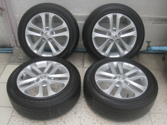 ขายล้อแม็กป้ายแดง nissan juke 17"x7" et45 5รู114.3 พร้อมยาง bridgestone turanza gr-90 215/55r 17 ยางผลิตสัปดาห์ที่48,2 เส้นและ49,2เส้น ปี13 ริ้วและสีที่หน้ายางยังมีเห็นชัดเจน2 เส้นครับ อีก2เส้นเห็นบ้างเล็กน้อยครับ  nissan teana ใส่ได้เลยครับ สนใ