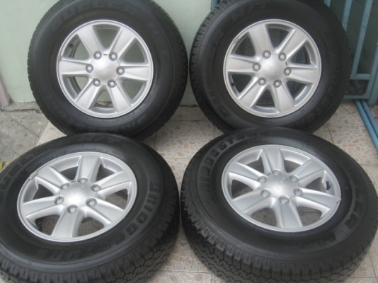 ขายล้อแม็ก new dmax 16"x7" et33 6 รู 139.7 ยาง bridgestone dueler h/t 689 245/70r16 ยางผลิตสัปดาห์ที่ 19 ปี 12 .ใช้มา 12,xxx km  สนใจติดต่อเล็กคลองสามครับ (081-3747940)