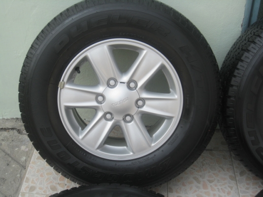 ขายล้อแม็ก new dmax 16"x7" et33 6 รู 139.7 ยาง bridgestone dueler h/t 689 245/70r16 ยางผลิตสัปดาห์ที่ 19 ปี 12 .ใช้มา 12,xxx km  สนใจติดต่อเล็กคลองสามครับ (081-3747940)