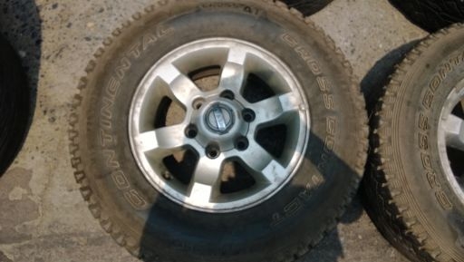 ต้องการขาย ล้อแม็กNissan Frontier ขอบ 15 พร้อมยาง คอนติเนียนทัล 225-70-15 AT แม็กเดิมๆยางพอใช้ได้ครับ 4วง 6,500 บาท