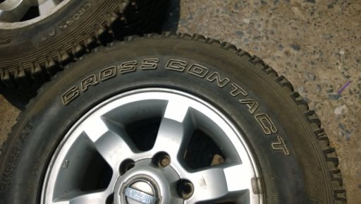 ต้องการขาย ล้อแม็กNissan Frontier ขอบ 15 พร้อมยาง คอนติเนียนทัล 225-70-15 AT แม็กเดิมๆยางพอใช้ได้ครับ 4วง 6,500 บาท