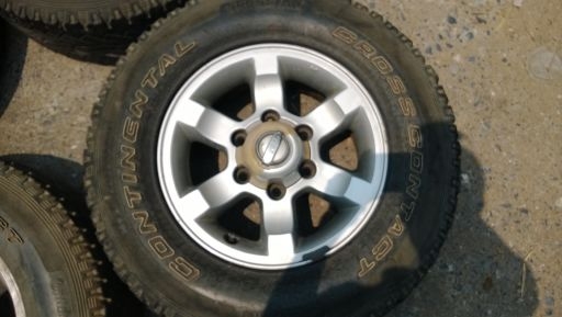 ต้องการขาย ล้อแม็กNissan Frontier ขอบ 15 พร้อมยาง คอนติเนียนทัล 225-70-15 AT แม็กเดิมๆยางพอใช้ได้ครับ 4วง 6,500 บาท