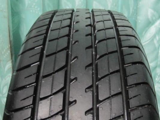 ขายกะทะพร้อมยางป้ายแดง 185 60R 15 ขอบ 15 ยังมีตุ่มหน้ายาง