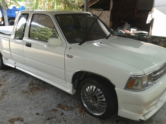 1991 TOYOTA HILUX MIGHTY-X 2.5 SGL X-TRA CAB โฉม X-Tracab  แต่งซิ่งยกปีก สีขาว เกียร์ธรมมดา แม็ก17 พวงมาลัยไม่พาวเวอร์ ราคา 99000 บาท