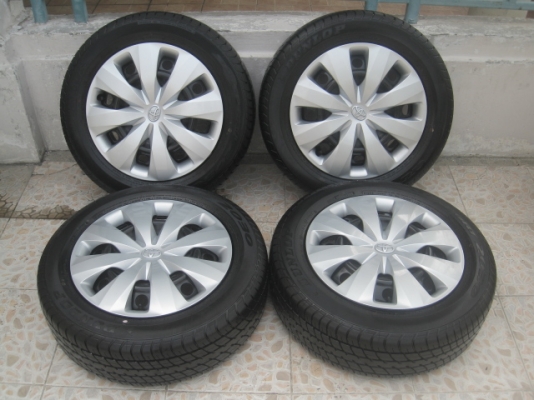 ขายล้อกะทะป้ายแดง new yaris ขอบ15 4รู100 พร้อมยาง ปี14 สนใจติดต่อเล็กคลองสามครับ (081-3747940)