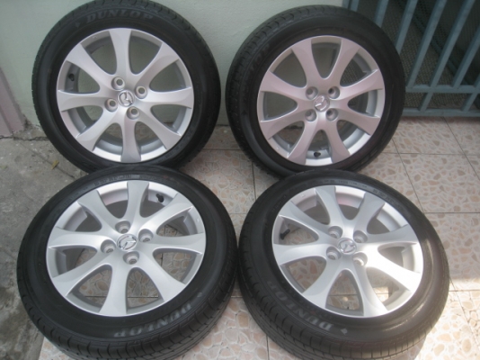 ขายล้อแม็กป้ายแดง Mazda2 15"x6" et45 4รู100 พร้อมยางปี13 สนใจติดต่อเล็กคลองสามครับ 081-3747940