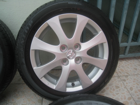 ขายล้อแม็กป้ายแดง Mazda2 15"x6" et45 4รู100 พร้อมยางปี13 สนใจติดต่อเล็กคลองสามครับ 081-3747940