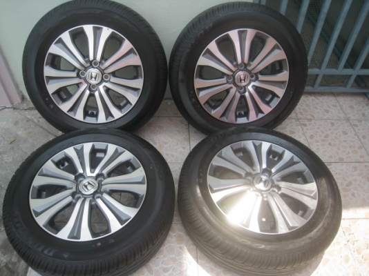 ขายล้อแม็กป้ายแดง Honda Freed 15"x5.5" et50 4รู100 พร้อมยาง ปี13  สนใจติดต่อเล็กคลองสามครับ (081-3747940)