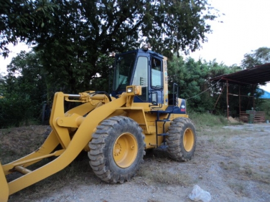 ละอองดาวแทรคเตอร์ ขายรถตักล้อยางยี่หัอ KOMATSU WA180-1 มือสองเก่าจากนอกสภาพดีราคาถูก พร้อมสำหรับการใช้งาน