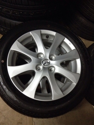 ขายแม็กมาสด้า2ป้ายแดงพรัอมยางขอบ15 ถูกๆ