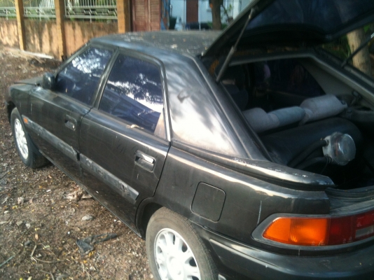 มาสด้า 323 เกียร์ออโต้ สีดำ 5 ประตู LPG มัลติ พร้อมโอน ขาย 33,000 บาท