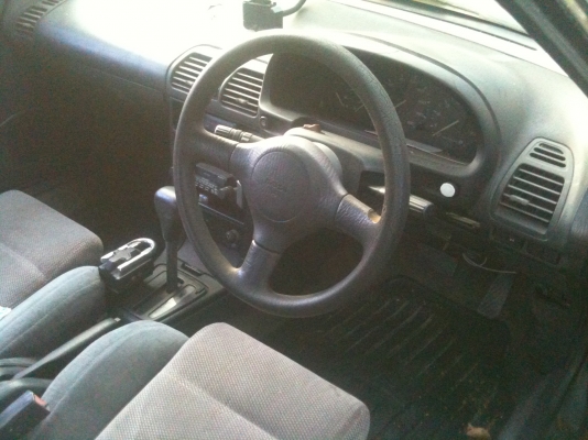 มาสด้า 323 เกียร์ออโต้ สีดำ 5 ประตู LPG มัลติ พร้อมโอน ขาย 33,000 บาท