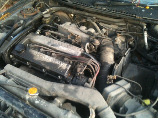 มาสด้า 323 เกียร์ออโต้ สีดำ 5 ประตู LPG มัลติ พร้อมโอน ขาย 33,000 บาท