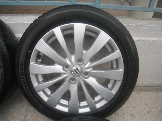 ขายล้อแม็กป้ายแดง Suzuki swift 16"x6" et45 4รู100 พร้อมยาง Bridgestone Turanza er300 185/55r16 ยางผลิตสัปดาห์ที่44 ปี13 ตุ่มและสีที่หน้ายางมีทุกเส้นครับ  สนใจติดต่อเล็กคลองสามครับ 081-3747940