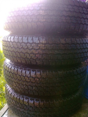 ยางป่าวป้ายแดงบิดโตน205R16ดูเลอร์689ปี4913