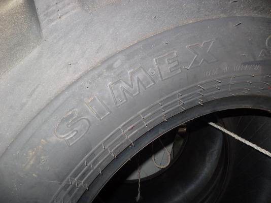 ยางใหม่ simex 16.9-24 ยางรถตัก มาจาก มาเลย์..มาเลย์