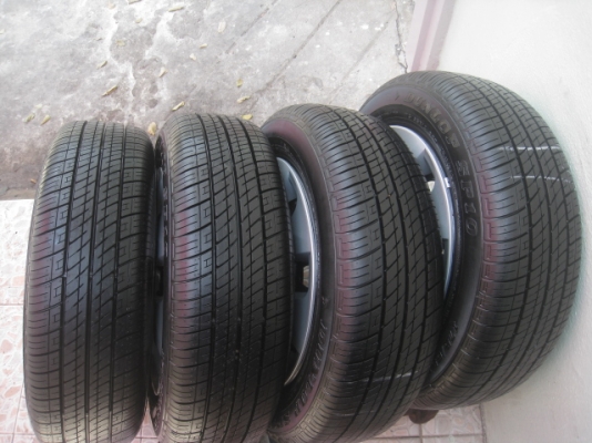 กะทะล้อป้ายแดง new yaris ขอบ14 4รู100 พร้อมยางปี14  สนใจติดต่อเล็กคลองสามครับ 081-3747940