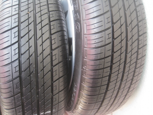 กะทะล้อป้ายแดง new yaris ขอบ14 4รู100 พร้อมยางปี14  สนใจติดต่อเล็กคลองสามครับ 081-3747940