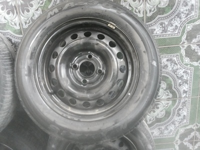 ขายล้อกะทะขอบ14 4/100 พร้อมยาง 175/60/14 ปี 10 1ชุด