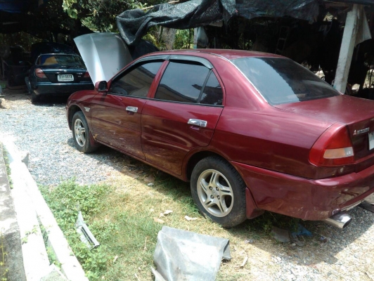 1997 MITSUBISHI, LANCER 1.5 GLXi โฉม ท้ายเบนซ์ 96-01  สีแดง เกียร์ธรรมดา ทะเบียน กท6364 กรุงเทพฯขายท้ายเบนซ์ สภาพเครื่องเกียร์ดีช่วงล่างดี สีบางๆ แอร์เย็นขี่ดี สภาพนี้เอาไปใช้งานได้เลย ขี่มันเอาไปแต่งเป็นอีโว ขายตัดถูกๆ m บ้านนา
