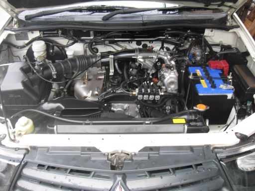 ขายมิตซูไทรทัน ตอนเดียว 2.4 เบนซิน+lpg หัวฉีด ใส่ตู้ทึบสูง 2 m.