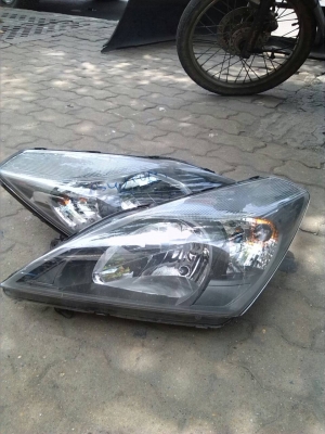 ขายไฟหน้า เอ็กโซร่า 1 คู่