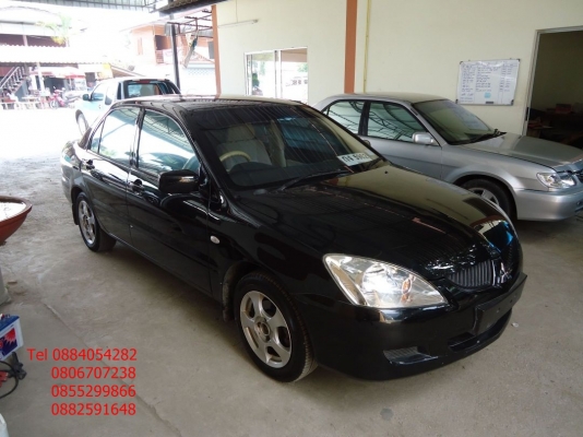 ขาย Mitsubishi New Lancer สีดำสวยมาก ติดแก็ส lpg ราคา 235,000 บาท +++++