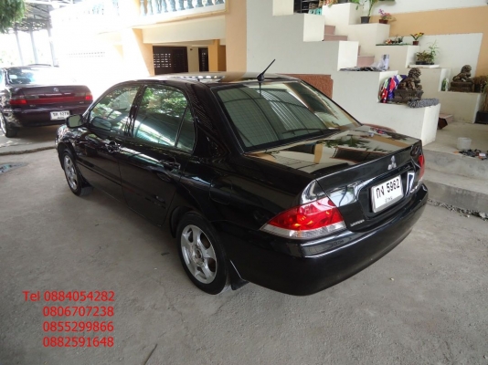 ขาย Mitsubishi New Lancer สีดำสวยมาก ติดแก็ส lpg ราคา 235,000 บาท +++++