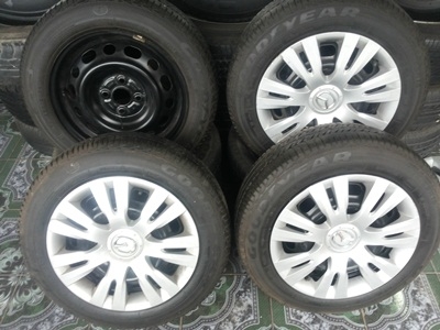 ขายล้อกะทะ15 4รู100 MAZDA พร้อมยางและฝาครอบ 1 ชุด ขายล้อกะทะ15 4รู100 MAZDA พร้อมยางและฝาครอบ 1 ชุด