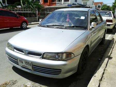 MITSUBISHI e-car ปี 94 เครื่องหัวฉีด 1500 เกียร์ออโต้ กระจกไฟฟ้า ภายในสะอาด แอร์เย็น มีเกจ์วัด 3 ตัว ไฟซีนอน แม็กซ์ 15 ราคามอเตอร์ไซด์