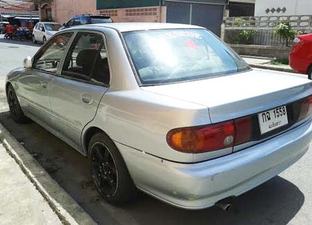 MITSUBISHI e-car ปี 94 เครื่องหัวฉีด 1500 เกียร์ออโต้ กระจกไฟฟ้า ภายในสะอาด แอร์เย็น มีเกจ์วัด 3 ตัว ไฟซีนอน แม็กซ์ 15 ราคามอเตอร์ไซด์