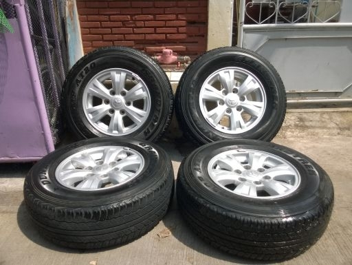 ล้อแม็ก Mitsubishi Triton-plus ขอบ 16 กว้าง 7 ออฟ38 พร้อมยาง Dunlop Grandtrek 245-70-16 ปี12 สภาพพร้อมใช้ มีรอยนิดเดียว ราคา 4 วง 11,500 บาท
