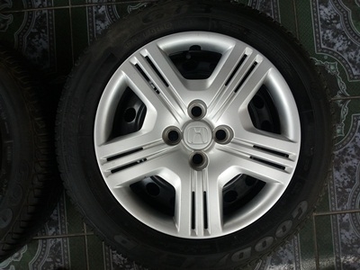 ขายล้อกะทะ HONDA ขอบ15 4รู100 พร้อมยางและฝาครอบ 4 ล้อ