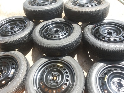 ขายล้อกะทะ HONDA ขอบ15 4รู100 พร้อมยางและฝาครอบ 4 ล้อ