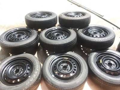 ขายล้อกะทะ HONDA ขอบ15 4รู100 พร้อมยางและฝาครอบ 4 ล้อ