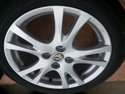 ขายล้อแม็ก Mazda 2 พร้อมยาง 4 เส้นพร้อมยางBRIDGESTONE