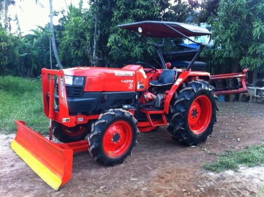 ขายรถไถkubota L4508 พร้อมอุปกรณ์2ชิ้น ดันหน้า ผาน6ใบ24 ตราช้าง พร้อมเล่มทะเบียน