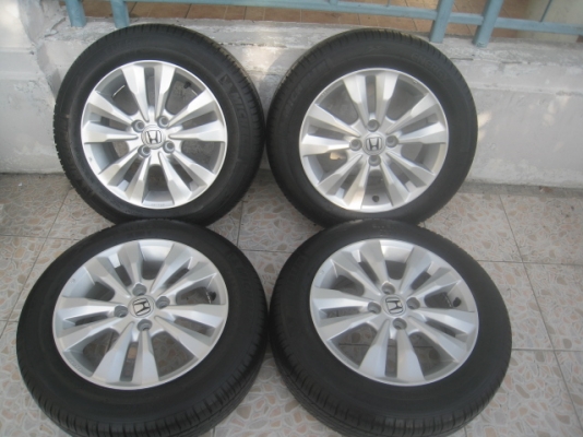 ขายล้อแม็ก Honda City 15"x5.5" et45 4รู100 + ยางปี12  สนใจติดต่อเล็กคลองสามครับ 081-3747940