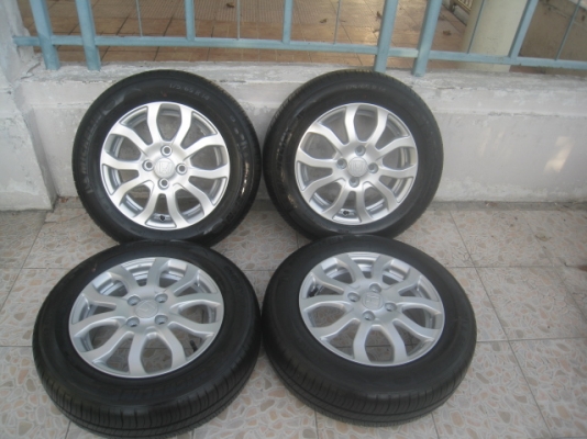 ขายล้อแม็กป้ายแดง Honda Amaze 14"x5" et50 4รู100 + ยางปี13 สนใจติดต่อเล็กคลองสามครับ 081-3747940