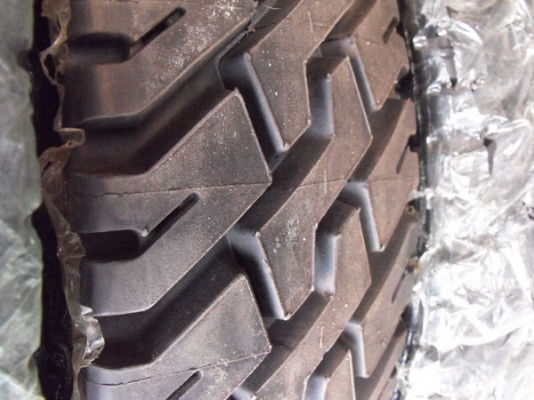 ขาย ยางผ้าใบอัดดอก แบบอัดเย็น ขนาด 1000-20