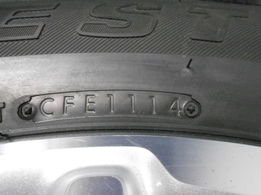 ขายยาง Bridgestone 265/60/18 ป้ายแดงปี 14 ใส่ ถ่วง ฟรีค่ะ