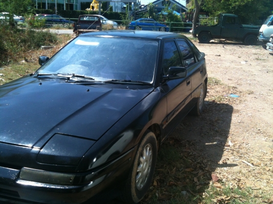 มาสด้า 323 สีดำ เกียร์ออโต้ เครื่องเดิมหัวฉีด LPG มัลติ ภายในสวย ทะเบียน เม.ย.54 พร้อมโอน ขับได้ปกติ ขาย 30,000 บาท