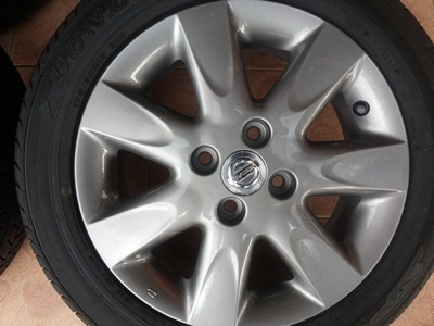 ขายล้อแม็กNISSAN March ขอบ15 (สีกัล) พร้อมยาง ปี13 1 ชุด