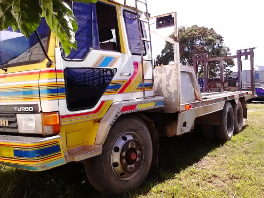 ขายเทเลอร์บรรทุกรถเกี่ยว มิตซู FN215 ฃ่วงล่างจัมโบ้ หมวกเจ๊ก