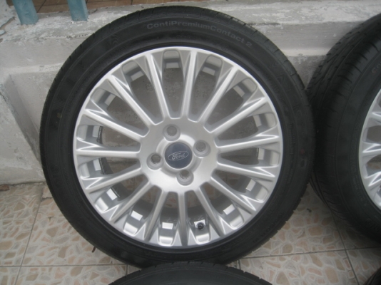 ขายล้อแม็กป้ายแดง new fiesta 16"x6" et47.5 4รู100 ยางปี13สนใจติดต่อเล็กคลองสามครับ (081-3747940)