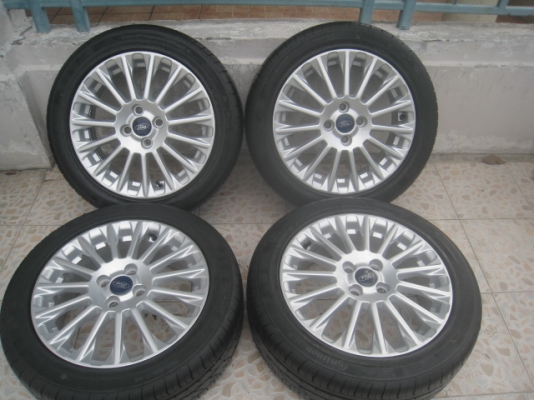 ขายล้อแม็กป้ายแดง new fiesta 16"x6" et47.5 4รู100 ยางปี13สนใจติดต่อเล็กคลองสามครับ (081-3747940)