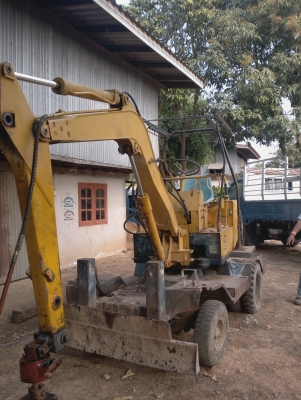 ขายแบคโฮล้อยางคีบไม้หมุนได้