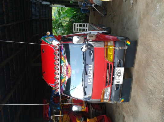 รับจ้างขนย้ายรถไถและสิ่งของ