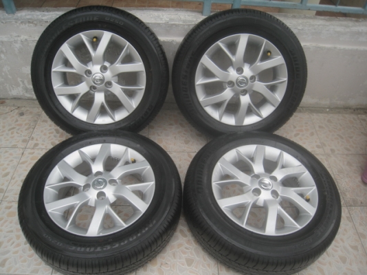 ขายล้อแม็กป้ายแดง Nissan Almera 15"x5.5" et40 4รู100 พร้อมยางปี13สนใจติดต่อเล็กคลองสามครับ 081-3747940